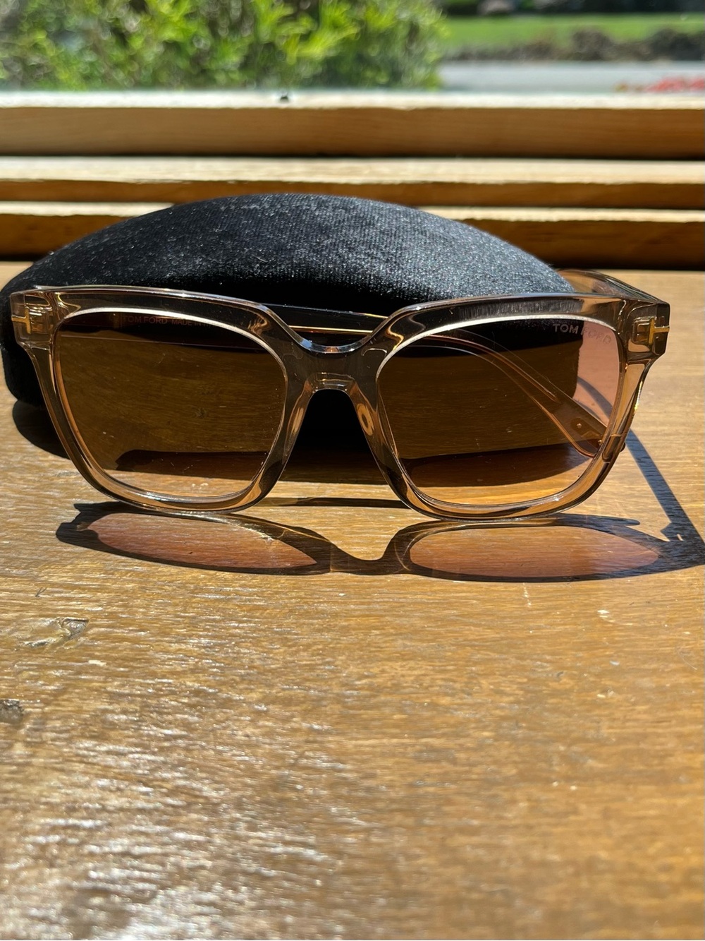 Tom Ford translucent beige frame sunglasses with light pink lenses